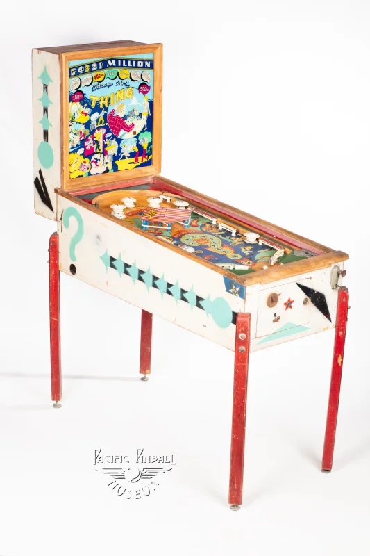 thing-250-34.jpg pinball machine - Preview image showing playfield artwork and design details